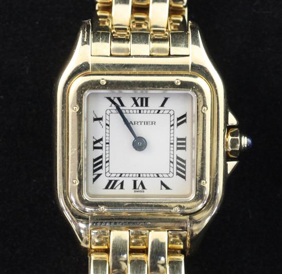 A ladys 18ct gold Cartier Panthere quartz wrist watch, with Cartier box.